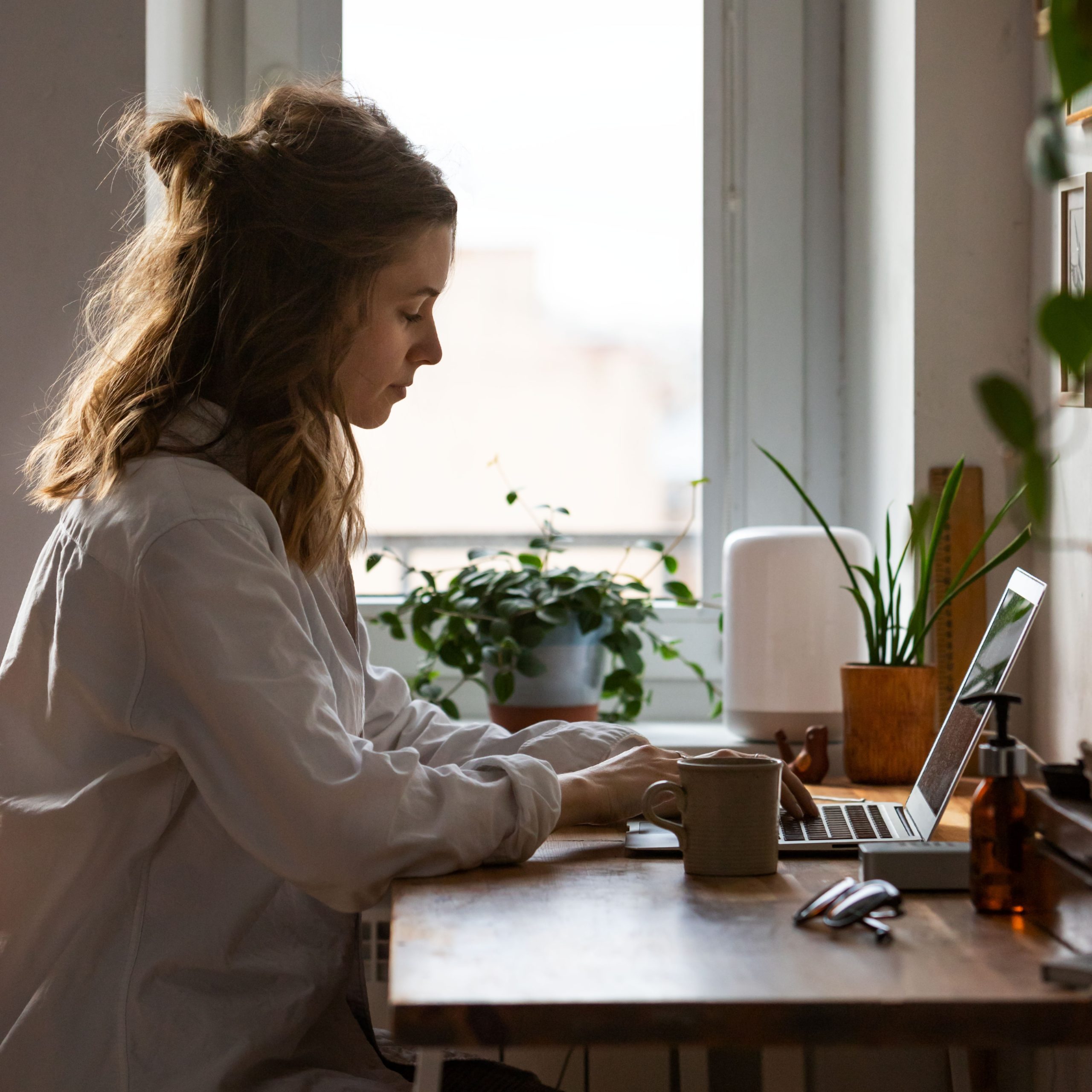 woman freelancer remotely working on laptop